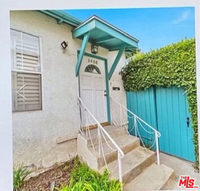 3408 Pearl Street Santa Monica, California Great investment opportunity. Charming Triplex located in desirable Sunset park Santa Monica in walking distance to the trendy shops, Restaurants, schools, Parks and easy access to freeway. Front house consists of 2BD & 1 BA remodeled kitchen including washer and dryer, remodeled BA, living room with Hardwood floor double door open to a large private patio. The two units in the back each has remodeled 1BD/1BA with similar layout. Two car garages in the back, one large storage unit, additional parking spaces available in the back of the property. This property is ideal for an owner/user investment - live in one and collect income from the other 2 units. Front house is vacant and one of the back unit can be delivered vacant, the 3rd unit can be negotiated.