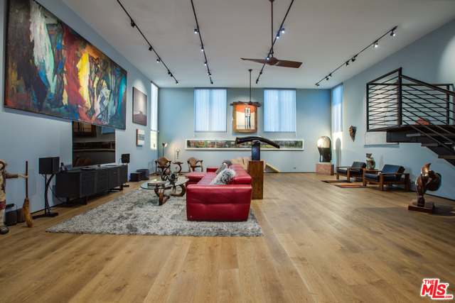 663 Brooks Avenue Venice, California TRIBECA COMES TO VENICE! This spectacular 3 bed/ 3 bath loft style home, with extremely stylish, yet comfortable furnishings is also filled with museum quality contemporary art. It boasts a funky magnificence unlike any other Venice space. With exceptional living areas, centered around a 1400 sqft Great Room, with soaring 15 ft high ceilings and mahogany floors ,leading into the gourmet kitchen, with 400 bottle wine storage. This is a truly amazing entertaining space. The lower level comprises of 2 bedrooms and a study, while the master suite is on the top floor and has a Euro-style bathroom with a 2 person Jacuzzi. The huge roof terrace with fire pit, barbecue and lots of greenery is great for al fresco entertaining and enjoying the sea breezes and views. The property is back off the street and very quietly situated, finally there is parking for 2 cars. A fabulously appointed, very private property in great Venice location.