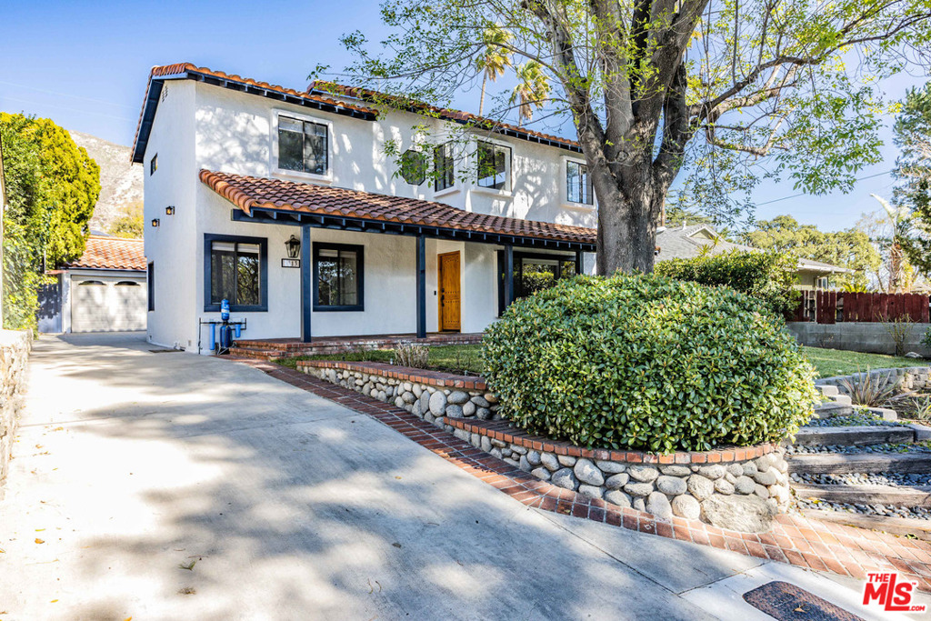 This is the family home you've been looking for. Set on a quiet street high in the foothills of La Crescenta, this immaculate home offers gorgeous mountain views. First floor features a bright living room with hardwood floors, updated kitchen with quartz counters and quality stainless appliances, and family room with beamed ceiling. Adjacent dining area opens onto the private backyard for entertaining or kids' play area. The large utility room is perfect for a computer station, artist studio or pet retreat. There is a downstairs bedroom with full bath, and plenty of storage throughout. Upstairs is an on suite bedroom with bath, and spacious master suite featuring vaulted ceilings, ample closet space including cedar lined, and dual vanity. French doors open to a charming retreat ideal for a home office, nursery or exercise studio. Two-car garage. Close to parks, hiking trails and award-winning schools, this is a beautiful home in an ideal neighborhood! ALL OFFERS ARE DUE BY SAT 03/06 6PM. ALL OFFERS TO CROSS QUALIFY.