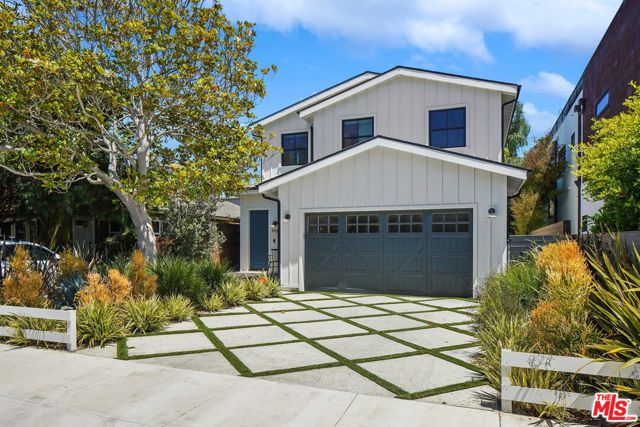 This beautiful California Coastal 2019 built home on a wide boulevard in the heart of Venice features stylishly sophisticated touches throughout.  The dramatic first floor, with high ceilings and warm oak floors, offers a wide open floor plan with a seamless flow. Cuddle up for movie night in the fireplace-warmed living room, throw a dinner party for 12 in the elegant dining room, and really get the party started in the expansive kitchen with an entertainer's center island, Wolf and Viking appliances and walk-in pantry.  Fold back the accordion-glass doors as the party spills outside to the big back deck and huge grassy lawn, framed by mature hedging and a trio of graceful palm trees just screaming for a hammock.  Upstairs, all four light-filled bedrooms are complemented by their own en-suite baths, and where in the primary, the French doors open onto a private balcony overlooking the entire back garden. Elegant, tasteful and designed with Southern California living in mind. Close to restaurants (Superba Food + Bread, Zinqu, The Penmar), shopping (General Store, Salt) and all that Abbot Kinney and the Rose Corridor have to offer, and less than a mile to the beach.