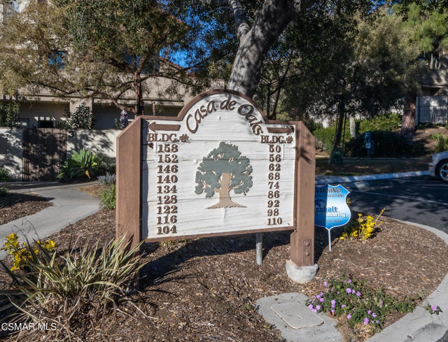 68 Maegan Pl. #9-37 - Casa De Oaks sign