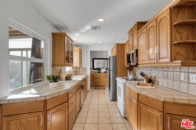 9610 Odessa Avenue, Northridge CA: https://media.crmls.org/mediaz/0c03493f-601c-4eff-9254-6def3c09ba40.jpg