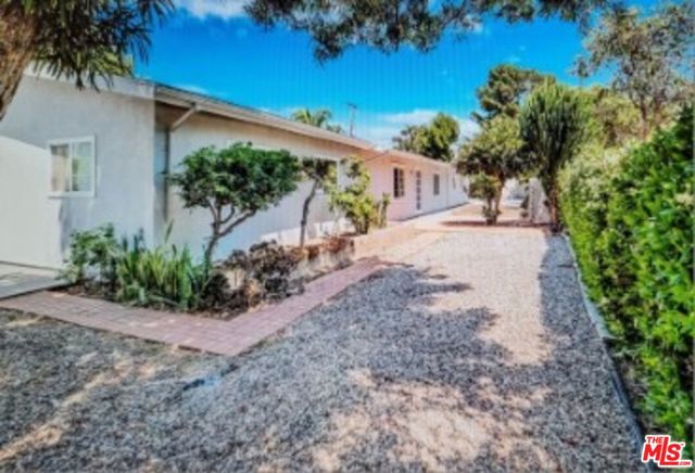 4669 W Olympic Boulevard, Los Angeles CA: https://media.crmls.org/mediaz/0cc4cd6d-cc1a-400e-a3dd-66d9239dec40.jpg
