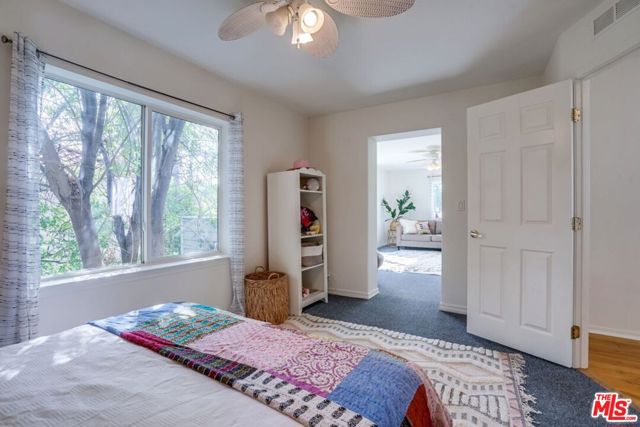 Bedroom with connected play room/office or bedroom