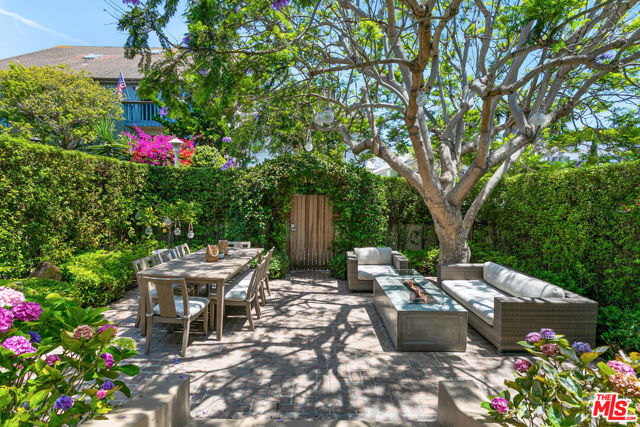 41 Paloma Avenue Venice, California Beautifully renovated 1906 California Craftsman on a nostalgic, valuable Venice Beach 'Walk-Street'. Steps to the sand, near the Venice Beach & Santa Monica Beach border, this classic home exudes character and charm. Thoughtful renovations blend the past and present. Refinished hardwood floors throughout, fully updated kitchen with stainless steel appliances, custom cabinets, refinished 1924 claw-foot bathtub and other bespoke details. Securely park two cars within a motorized roll-gate with secure access to home. An efficient floor plan includes three en-suite beds on first level and dedicated primary-suite on the entire second level. Primary-suite includes vaulted ceilings, his and her closets, built-ins and an enchanting full bath. Additional vaulted ceilings in the main and an open floor plan make this special bungalow feel more voluminous than its listed interior square footage. Mature landscaping and secure gates with code access outline the entire property line allowing you to relax and enjoy every square foot of your land. Cozy up to the living room fireplace, outdoor fire pit, grill outdoors, soak in the jetted hot tub, store your surfboards and bikes and embrace the outdoor Venice Beach lifestyle at its best. All furniture and personal property may be included in the sale.