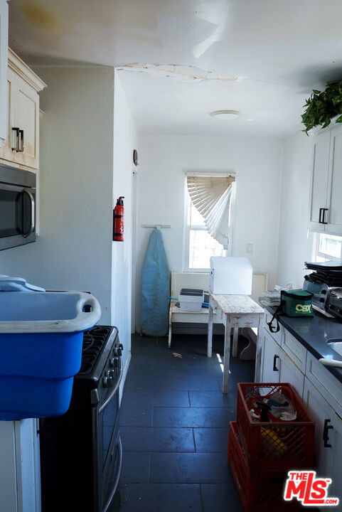 715 W 104th Street, Los Angeles CA: https://media.crmls.org/mediaz/0e3dc4d8-5b69-46d9-aa3e-7215d93afe9b.jpg