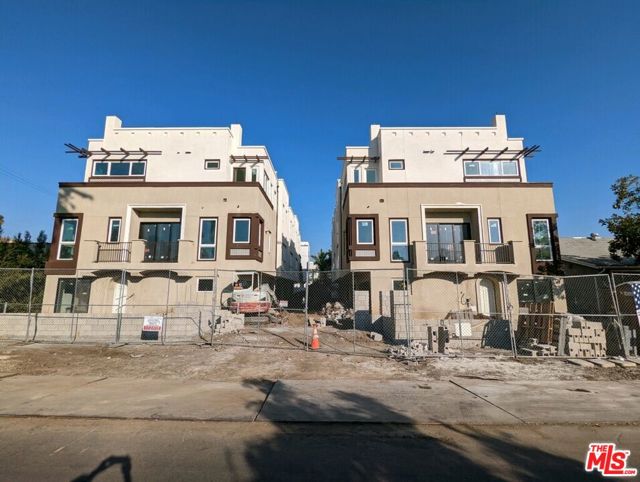 1248 Lodi Place Los Angeles, California Welcome to The Marbella, a New Construction complex with gated 10 Small Lot Subdivision homes in the heart of Hollywood with potential Opportunity Zone benefits - finishing details being completed now. These unique 3BD, 4BA tri-level homes are exceptionally bright, designed to achieve a perfect balance of timeless design, sophistication, quality and elegance using warm wood floors, large windows, high ceilings, and classic tiles. Main living level offers an open space inviting you to entertain, dine or relax while taking in the city views; Stunning kitchens equipped with center eat-in islands, custom cabinetry and shelving. Each room feels complete with built-in closets and filled with natural light. Chic Bathrooms and luxury design elements throughout each home. Sealing your experience with an enormous rooftop deck BBQ ready providing the perfect spot to unwind and take in the sunsets surrounded by breathtaking views and the Hollywood sign. First floor bedroom and bath perfect for work from home. Attached 2 car enclosed garages for each unit. Private laundry for each townhome which can be individually sold or rented in the future. Make this dream home your reality!