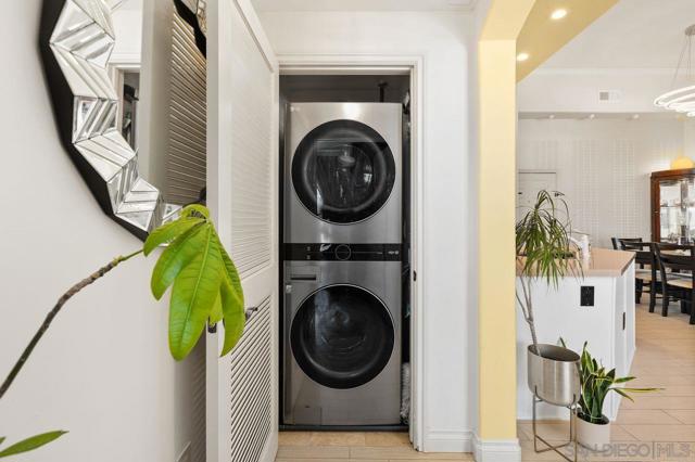 Newer front-loading energy-efficient LG washer and dryer almost as big as side-by-side washer & dryer.