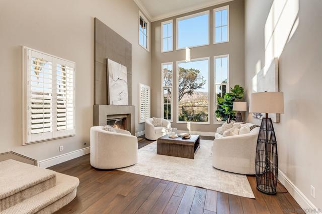 Formal Living Room with High Ceilings and Large Picture windows