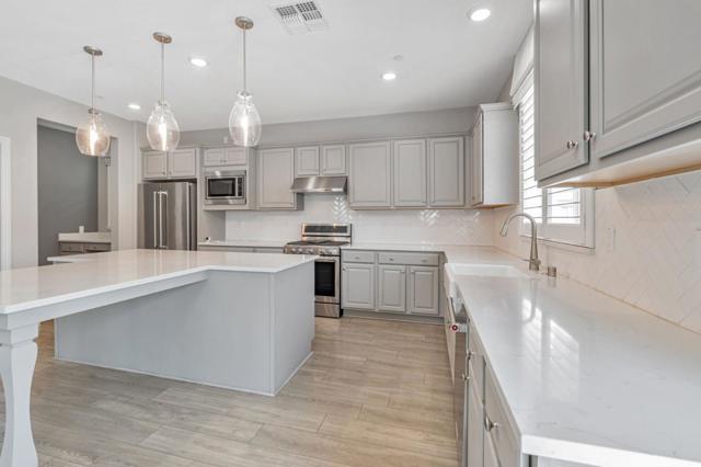 3057 Garden Farms Avenue, Lathrop CA: https://media.crmls.org/mediaz/0e7029bb-e708-461d-a7d3-2a9557edd682.jpg