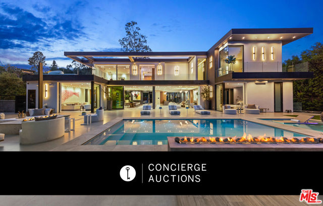 AUCTION: Bid 14-21 December. Listed for $23.995M. No Reserve. Starting Bids Expected Between $8M-$12M. Showings Fri-Sun 1-4PM & by appointment. This gorgeous contemporary Bel-Air estate features beautiful architectural details inside and out. With high ceilings, an open-flowing floor plan, and dramatic entertaining spaces, this property was built for festive gatherings large and small! The oversized chef's kitchen has Miele appliances, and the wine room and champagne bar are built to impress. As fits a house in Los Angeles, there is a spacious basement with a home theater featuring a top-of-the-line sound system, a lounge, and a tequila bar. For a quiet night in, enjoy a workout in the large home gym or relax in the spa. Outside, you can continue to entertain with dinner from the outdoor pizza kitchen or lounge by the pool. The terrace upstairs overlooks the outdoor space, with a firepit to keep you cozy on cooler nights.