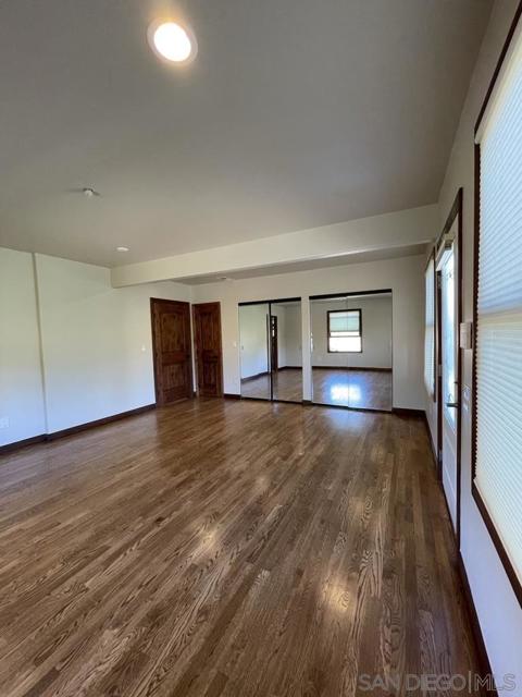 Primary Bedroom with views and access to back yard.