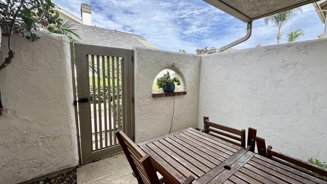 with door which leads to walkway to pool area