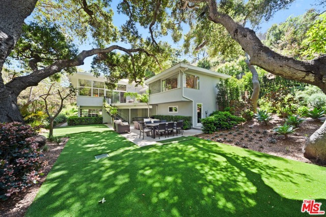 6341 Ramirez Canyon Road Malibu, California Garden oasis in Ramirez Cyn, Malibu, Post and Beam, mid-century modern home with garden and treetop views on approx. 2.3 acres with easy access to Paradise Cove Beach under the PCH tunnel. A seasonal stream runs through the property, there are fruit trees and a green house, plenty of natural sunlight on this private enchanting property. This well maintained and updated with new air ducts, and various interior and landscaping updates make this Malibu home a great residents for the discerning tenant who appreciates the original feeling of Malibu.