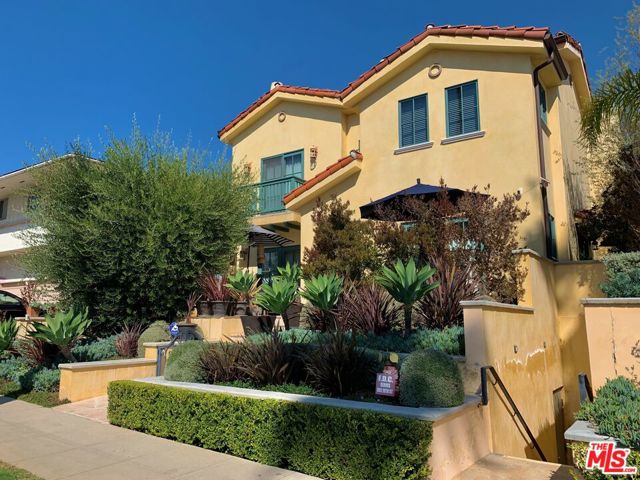 851 19Th Street 102 Santa Monica, California This exquisite Mediterranean 3 bed+2.5bath townhouse boasts an elegant open floor plan w/ a large formal living room, dining room, beautifully refinished wood floors, fireplace, surround sound system, and vaulted ceilings. French doors leading to a large garden patio, with newly tiled floors and custom built-in patio seating. Open style gourmet kitchen features top-of-the-line appliances, granite countertops, lots of storage, and a breakfast bar area. Balcony in the primary bedroom and also in the second bedroom, where you can enjoy the beautiful landscape and palm tree views. Primary bedroom has fireplace high ceilings and a walk-in closet. Entertain in the lovely rooftop deck and savor the views of the city, palm trees and even a little bit of the ocean. Complete with private two car garage with direct access to unit. Located just minutes from Montana Avenue shops and restaurants,.