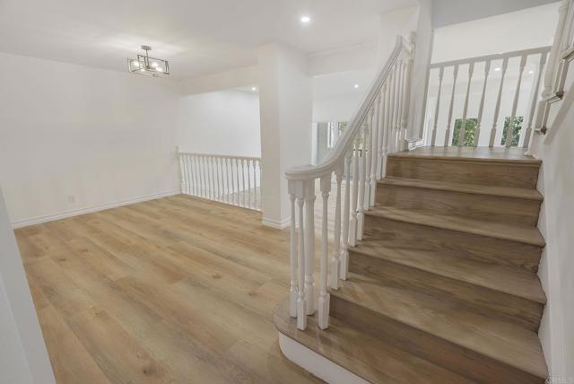 Stairway to 2nd level:  2 Beds + 2 En Suite Baths + XL Family Room or Multipurpose/Laundry+Balcony.