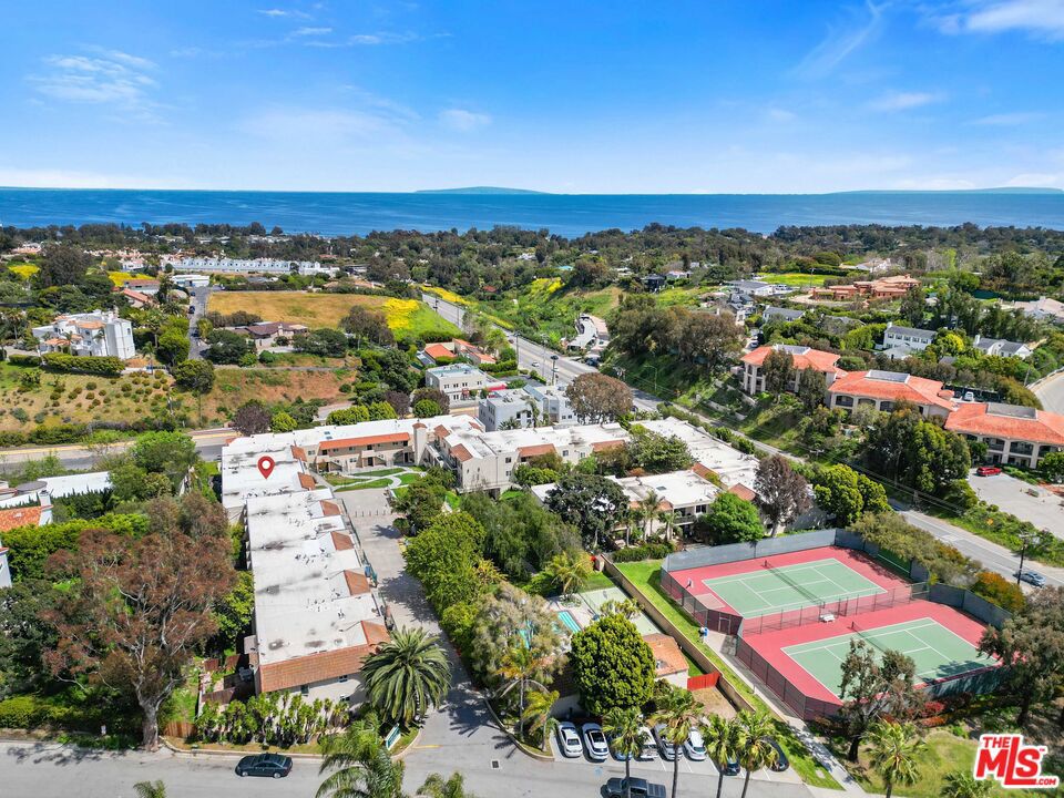 Live the Malibu lifestyle with fresh air, ocean breezes, and the beauty of nature all around you! Updated first floor unit with two ensuite bedrooms. Spacious primary suite with walk-in closet and separate door to large exterior private patio area. This renovated unit features granite counter tops, shaker style kitchen cabinets, laminated wood floors, recessed lighting, spacious eat-in dining area, and expansive living room with fireplace. Large exterior private patio is perfect for pets, BBQ and outdoor furniture. Located in the back of the unit, where no one can see, the patio faces a lush green hillside, adding to the serene and quiet location with no road noise. Two side by side covered carport parking spaces nearby, reserved specifically for this unit, located down the stairs facing Kanan Rd. Minutes to hiking, Pt. Dume headlands, award winning schools, shops, cafes, and world famous Zuma Beach. Fine dining at Nobu, luxury shopping at Cross Creek, Pepperdine University and newly opened Santa Monica College Satellite campus, only 10-12 min away. This condo is conveniently located 18 min. over Kanan Dume Rd. to the 101 freeway, and a 30 min. drive to Santa Monica, with easy access to LAX. Two community laundry rooms directly across the courtyard.  ** 24 hours notice is required for all showings. Tenant occupied until 06-30-23. **