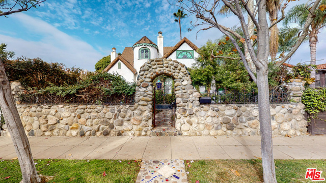 681 San Juan Avenue Venice, California Step behind the enchanting stone walls for a one of a kind private artists enclave in prime Venice Beach location. The home has many details lovingly added by the current owner over the past 23 years. Artisan touches such as hand made tiles, stained glass windows, infinity ceiling, rounded walls, & original detailing are just a few of the details that add to the bohemian charm this property offers. Originally a single-family home now a duplex with a large studio unit upstairs (1458 +/- SF) & a 3-bedroom, 1-bathroom unit downstairs (1920 +/- SF). Two outdoor entertaining spaces, the oversized covered patio or upstairs deck & private backyard, enjoy the ocean breeze. There is a two car garage along with extra storage room. Wonderful investment opportunity as-is or an ideal project for an owner-user who would like to live the Venice Beach lifestyle close to the beach and make it their own. Potential to turn back into a single family home with a master suite upstairs.