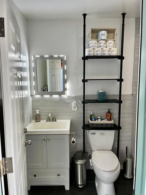 Outdoor bathroom attached to garage