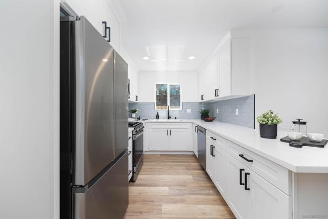 6744 6750 N Elman, San Diego CA: https://media.crmls.org/mediaz/1155593a-6b43-4735-960b-3d23d4e34d8c.jpg