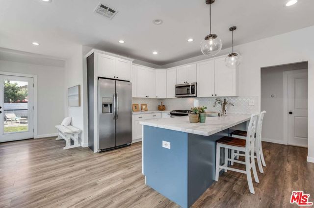 1304 -1306 W 48th Street, Los Angeles CA: https://media.crmls.org/mediaz/11771549-df90-4c24-a614-043bbf22026d.jpg