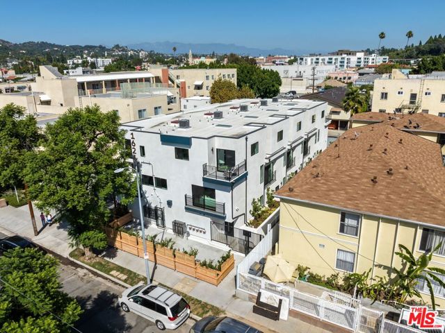 1624 Normandie Avenue, Los Angeles, California 90027, 3 Bedrooms Bedrooms, ,2 BathroomsBathrooms,Townhouse,For Sale,Normandie,23311699