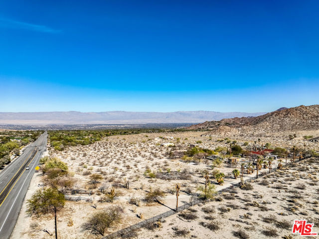 Nothing like this on the Market. Don't miss this rare opportunity to own 7.66 acres with 696 feet of frontage on Highway 74 just south of Bighorn Golf Club! Great value at a approximately $325k per acre. Great opportunity to create your own private compound. Property sits high up off desert floor with amazing views in all directions. Surrounded by Bighorn Golf Club and protected lands, this property is currently the most intriguing offerings in the Palm Desert area. (Zoning is Riverside Country R-1). Surrounding land is Bighorn Institute and National Monument land and will not be developed, thus protecting the views and serenity that this property offers. Property includes a 2,474 square foot home. Don't let this opportunity pass you by.