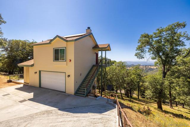 Newly built, 1 bedroom with deck and garage on 1 a one-acre hillside with panoramic views!