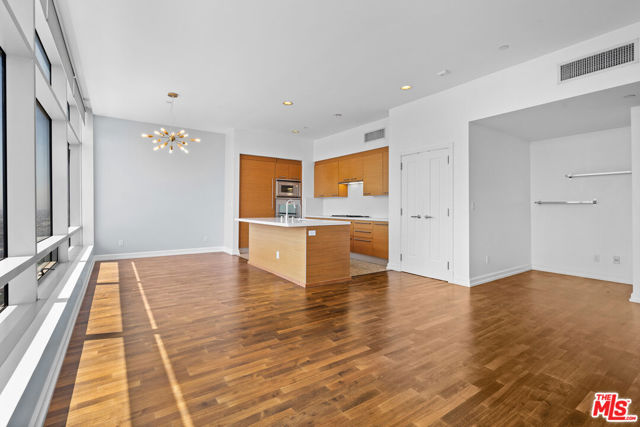 900 W Olympic Boulevard, Los Angeles CA: https://media.crmls.org/mediaz/1203300c-04e7-40fe-83fa-33b1fccc7ef9.jpg