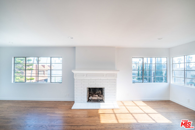 4511 Finley Avenue 6 Los Angeles, California Actual unit in photos. Video walk-through available. Welcome to the most charming 2bed/2bath available in Los Feliz. This top floor, South facing, corner unit enchants you the moment the door opens. Oversized living room windows flood the home with natural light to showcase the decorative fireplace encompassed by the original hardwood floors that lead you to your private balcony. The kitchen is equipped with a butcher block countertop and all stainless steel appliances. Two sizable bedrooms have an abundance of closet space and the master bedroom features authentic built-ins and en-suite bathroom. This pet friendly unit includes two parking and is located seconds from all Los Feliz has to offer. Griffith Observatory, restaurants, coffee, FWY access are all at your finger tips. This one won't last long.