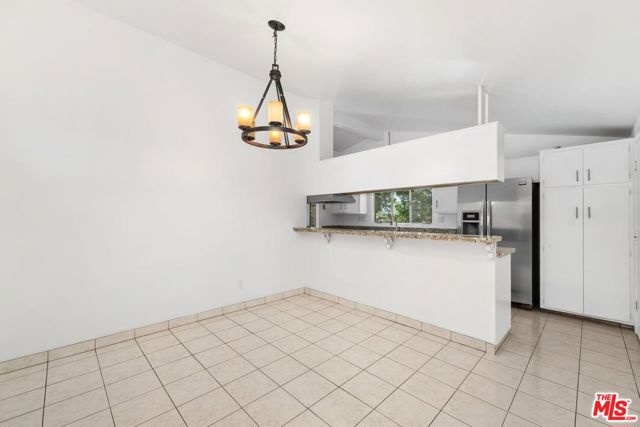 20553 Califa Street, Woodland Hills CA: https://media.crmls.org/mediaz/12267b3d-c7ca-40c8-8cab-19eddabb1a4c.jpg