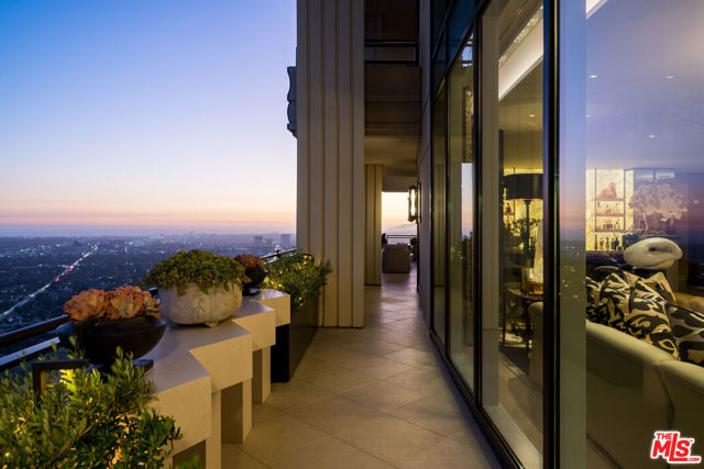 Amidst the upper echelon of The Century, Los Angeles' prestigious high-rise enclave, sits Penthouse 39. The meticulously crafted masterpiece, proffering 9,400+ square feet, 3 bedrooms, and 7 bathrooms, spans the entirety of the 39th floor. Opulence inspired by a well traveled sense of glamour. With the turn of a privately keyed elevator, the vestibule opens directly into the residence's foyer, where fumed Eucalyptus paneling, a ceiling adorned with hand painted 22k gold leaf and Cream Marfil floors set the stage for the unbridled luxury that awaits. Welcome to the crown jewel of The Century. From its lofty vantage point, the floor to ceiling windows capture the expanse of the city, while welcoming an abundance of natural light to illuminate the exquisite interior. Offering unparalleled panoramic vistas, the lofty residence captures the luxuriant expanse from the lights of Downtown to the iconic Hollywood sign, to the Pacific Ocean. The residence boasts an array of thoughtfully architected living spaces from which to generously entertain, including the awe-inspiring living room adorned with Macassar walls made from one single tree. The primary suite offers a sacred retreat. With its sitting room, immaculate bathroom replete with marble, custom vanity, dressing room and oversized mirrored closets, the space offers a respite from the outside world. A culinary enthusiast's dream, the kitchen boasts Midnight Sky Granite workspaces, professional grade Miele appliances and a considerable 13-foot island inviting gatherings and comestible creativity. The adjacent dining room reflects the grandeur of its rock crystal chandeliers and Cream Marfil floors. The formal dining room exudes an ambiance of refined sophistication, providing an ample expanse that is perfectly suited for elegant hosting and gracious entertaining. Seamlessly connecting the living and dining spaces is a 40-foot gallery ornamented with Eucalyptus paneled walls and striking Onyx accents. Every detail mindfully curated, the interior of PH39 also boasts a marble backlit bar, entertaining spaces, dual 11' projector screens descending from the living room ceiling, zone temperature control, and UV-insulated floor to ceiling windows to view the residence's wraparound terraces. In addition to the penthouse residence, the listing price also includes: Office Suite: Approx. 1200 Sq Ft on Separate Floor, Studio Suite: Approx. 500 Sq Ft on Separate Floor, Dedicated Pool Cabana, and 4 Private Parking Spaces. The Century spoils its residents with unmatched services, rivaling world-class hotels, including a private spa, resort-style pool, wine storage, screening room, fitness room, business center, children's playroom, and private dining. Embrace an outdoor lifestyle reminiscent of esteemed estates, relishing a glamorous lifestyle that surpasses expectations and sets a new standard for refined condominium living. Minutes aways from Beverly Hills, Bel Air and Holmby Hills.