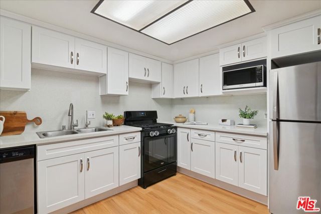 1050 S Garfield Avenue, Monterey Park CA: https://media.crmls.org/mediaz/12b055cc-af29-441a-afd9-ff33a2c6db8c.jpg