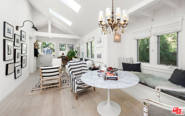 820 Amoroso Place Venice, California Located on one of the most coveted walk streets in Venice, this alluring home, consisting of a main house named the "Secret Garden Cottage" and an added second floor guest house above the freestanding garage named the "Tree Top Suite", sits just minutes away from the best Venice has to offer. Featuring a charming front house, the updated 1922 "Secret Garden Cottage" has a beautifully maintained, fenced-in front yard with two bungalow-sized Jack & Jill bedrooms, an upgraded kitchen, and a living room with large windows, providing a serene living space in the heart of Venice. The "Tree Top Suite" sits on the second floor, above the freestanding garage and is separated from the Cottage by a small courtyard. Natural light fills the oversized one-bedroom apartment with an open-plan living room, dining, and kitchen space. The property has a freestanding 2 car garage with two additional parking spaces provided on the lot. The two separate structures provide a great opportunity for guests/in laws or an income opportunity. https://vimeo.com/640222776
