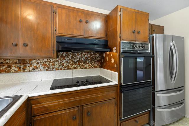 10021 Sierra Bonita, Spring Valley CA: https://media.crmls.org/mediaz/13424845-aa8e-4e98-9fe6-f376a4cd5377.jpg