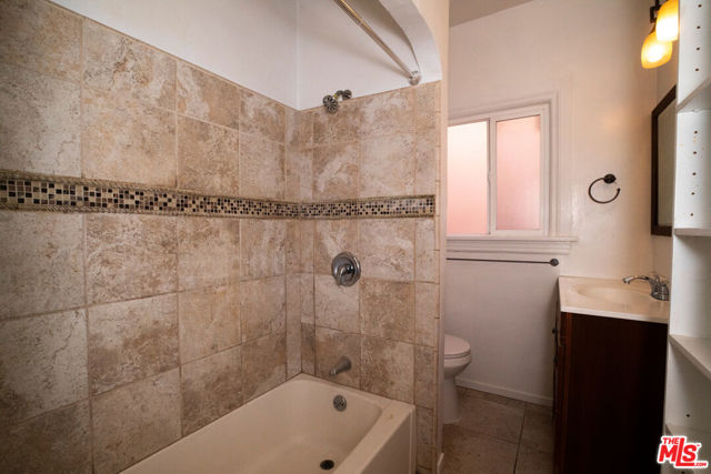 5700 Cimarron Street, Los Angeles CA: https://media.crmls.org/mediaz/145ccd06-8d7d-4a44-8f67-94d2d66ff00e.jpg