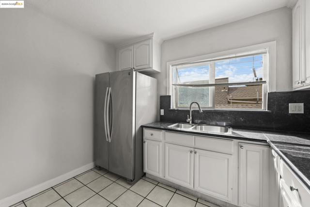 1311 87Th Ave, Oakland CA: https://media.crmls.org/mediaz/1479e0c5-7a1a-4f89-9535-1ffb3c7b87b2.jpg