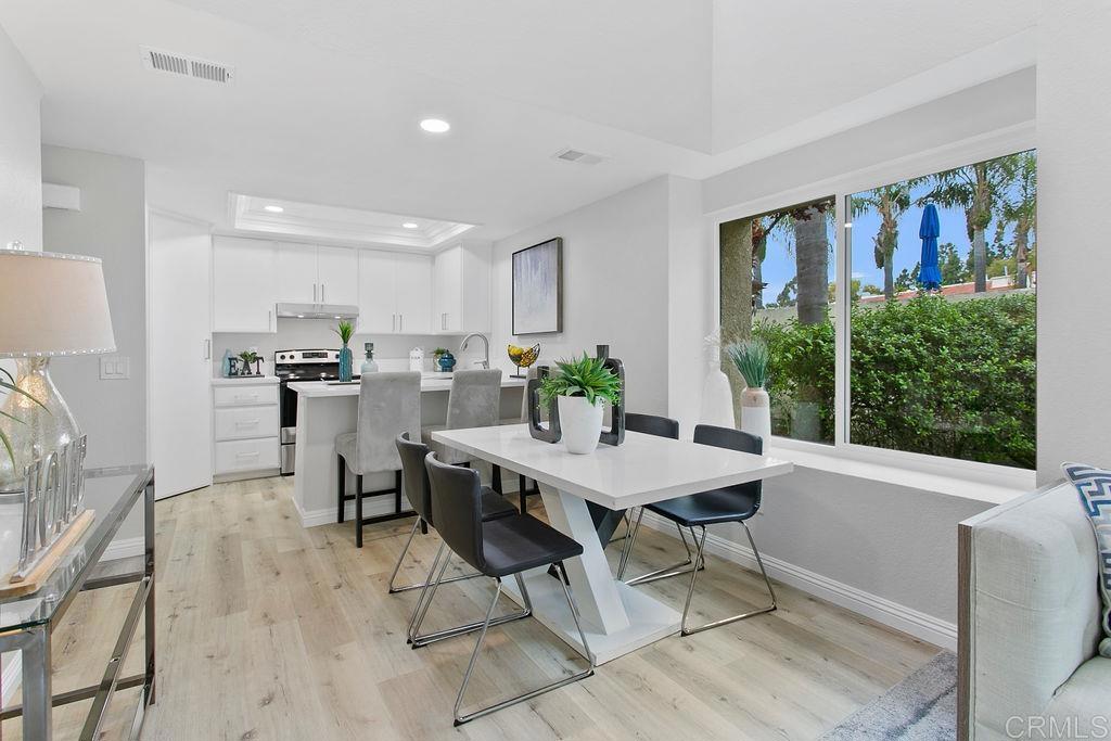 Prepare to be wowed by this exquisitely remodeled end-unit townhouse in the tranquil heart of Laguna Niguel! Step into a sunlit, open-concept living space that effortlessly flows into a chic dining area, perfect for entertaining guests or cozy nights in. The gourmet kitchen dazzles with sparkling new quartz countertops and top-of-the-line stainless steel appliances, ready for your culinary adventures. This home is designed for versatility: a main-floor bedroom and bathroom offer convenience, while upstairs, you'll discover a spacious bedroom, a beautifully appointed full bathroom, and a show-stopping loft, complete with a cozy fireplace, ideal as a stylish home office or relaxation retreat. New dual-pane windows and a slider bathe the home in natural light while ensuring energy efficiency. The community offers two pools and spas, a dog park and plenty of parking! This home is your gateway to the coveted Southern California lifestyle. Stroll to nearby parks, conquer scenic hiking trails and send the kids to top-rated schools. With vibrant shopping, dining, and Orange County’s iconic beaches just minutes away, coastal bliss is yours to embrace. Don’t miss this rare opportunity to own a turnkey masterpiece in a location that has it all!