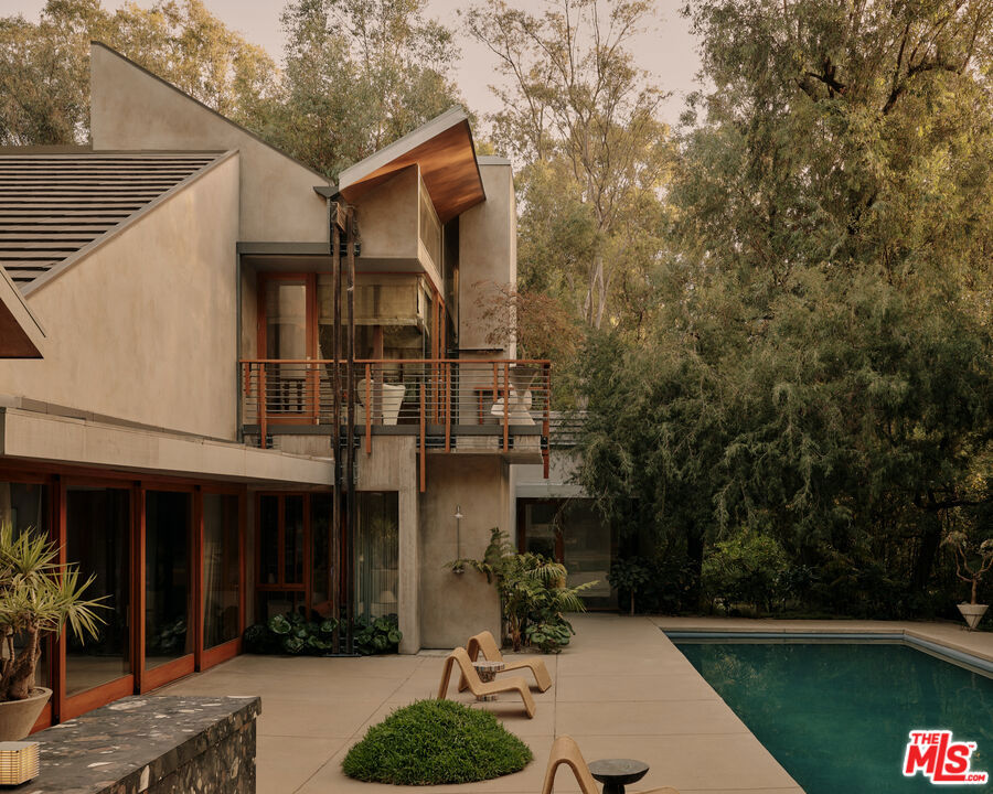 7728 Woodrow Wilson Drive — architectural residence