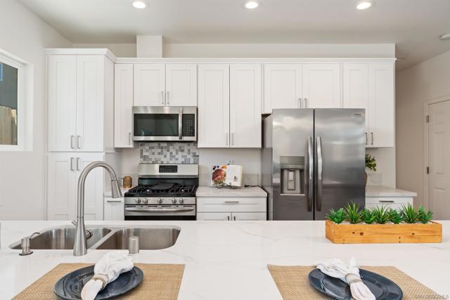 Virtually Staged - while the food is prepared there is seating for 4 and counter to do homework or chat or compliment the chef.