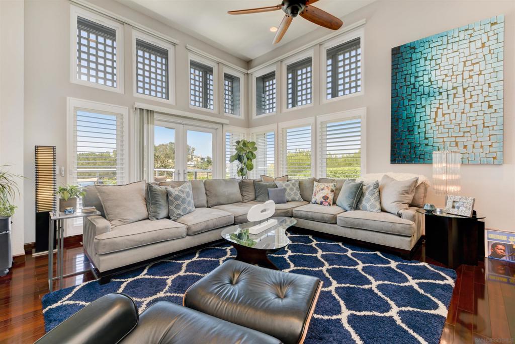 959 America Way Del Mar, California The definition of design is the arrangement of elements, aspects, and details that produce a work of art. 959 America Way is the quintessential example of such. This stunning 2 Bed, 2.5 Bathroom, luxury home located within the exclusive community of Spindrift at Del Mar has been painstakingly crafted with nothing but the finest materials. Offering dual-master suites, each with their own patio access, walk-in closets, spacious ensuite bathrooms with Porcelanosa tile, marble flooring, Corian counters, and Dyconn vanities leave no detail untouched. The gourmet kitchen offers top-of-the-line appliances, such as Sub-Zero, Wolf & Jenn-Air, this space ideal for someone who enjoys cooking. Just steps from the kitchen is the living room. Offering wall-to-wall hardwood floors, this bright & open space is perfect for large gatherings or simply a quiet evening in. Located upstairs from the living room is the loft. This private space offers a custom built-in desk & cabinets ideal for someone who works from home or maybe a private study. Unique to this property is the private yard. Ideal for pets, entertaining or working out, you have quiet area all to yourself. Designed with a 16-panel solar system, car charger, LED lighting, and drought tolerant landscaping, this property has been created to be environmentally friendly. The property has been extensively updated throughout. In 2016 a new Radford Garage Door was installed along with the epoxy floors and cabinets. The Front Door was custom built by 'Grand Entrances' in Miramar. New window treatments and screens were also installed along with the two (2) Chandeliers. LeGrand switches were then added throughout along with two (2) Casablanca Ceiling Fans, the Porcelanosa Tile Wall in the living room, the Perlick Wine Fridge and the WOLF cooktop. The HVAC system was also replaced at that time and the interior was painted. In 2017 ALL of the windows were replaced, and the 16 Panel LG Solar system w/Enphase Microinverters were installed with a Car Charger in the garage. Lastly, all of the Bathrooms were remodeled completely as well as the Porcelain Tile flooring at the Entry. Equipment: Garage Door Opener, Washer Sewer: Sewer Connected Topography: LL