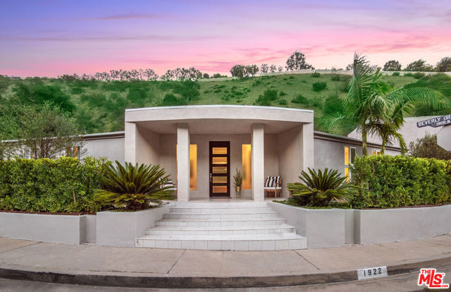 1922 N Beverly Drive Beverly Hills, California Fabulous renovated single story contemporary that has it all. Bright, fresh & spacious open floor plan with great indoor/outdoor flow. Gorgeous porcelain Italian flooring throughout. Large Formal Living spaces with highc eilings, double-sided fireplace and glass walls open to sprawling flat yard with Pool, Spa, turf plus entertainment space! Dining room features new built-in banquet, seating 12 people. Opening out to Al Fresco dining patio with mature Lemon, Grapefruit, and Avocado trees overflow with fruit. 4 large Bedrooms each with En-Suite baths. Master bathroom w soaking tub, remodeled in 2021. Bonus large separate "In Law" Suite or Home Office w/ own kitchenette, in private upstairs wing. Enjoy full sun on the pool all day, or swim under the stars surrounded by 360 degree lush mountains and full privacy. Special "non toxic" upgrades including advanced HALO system Water Purification system throughout entire home, new hospital grade "clean" HVAC air ducts, Non chlorinated Ozone/UV Light Pool & Spa system. EMF proofed throughout for maximum health benefits, etc. Other rare features including: Parking for 20+ cars, Extra wide street plus sidewalks , Wrap around Corner lot with no neighbor, Single Level home w/ walk out flat lot rarely found in hills. Additional upgrades include new Roof, Tankless Water heater, etc.. Walking distance to best hiking in LA, Franklyn Cyn, a Lake, and Coldwater Canyon park! 3 minutes to Rodeo Drive and The Beverly Hills Hotel. ALL OFFERS due by 12pm, Saturday Oct 23rd. No showings between 10am-1:00pm. *24 hour notice to show*