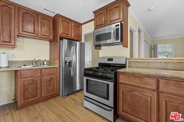 8116 Belford Avenue, Los Angeles CA: https://media.crmls.org/mediaz/15dde52e-0ca5-40cf-a95a-5db7ab072249.jpg