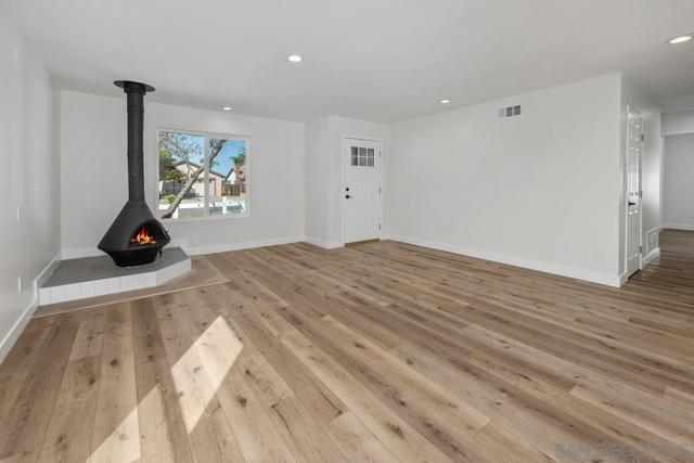 Living Room with Stand Alone Wood Burning Fireplace