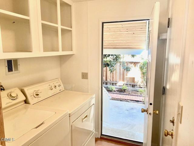 Laundry Room w Door to Backayard