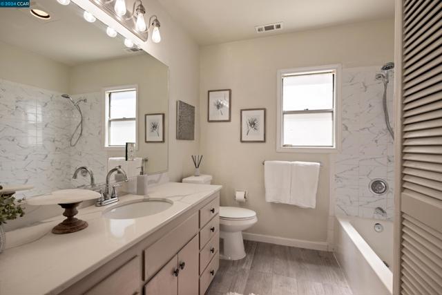 Full Bathroom with Shower over Tub