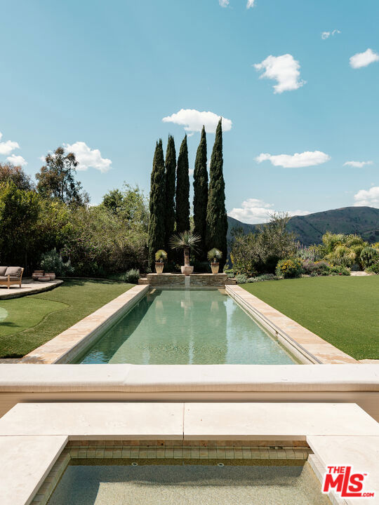 Drew Fenton | 12705 Chalon Road Los Angeles CA | MLS: 7169968