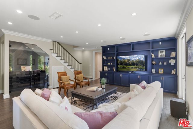 TV room with wine closet