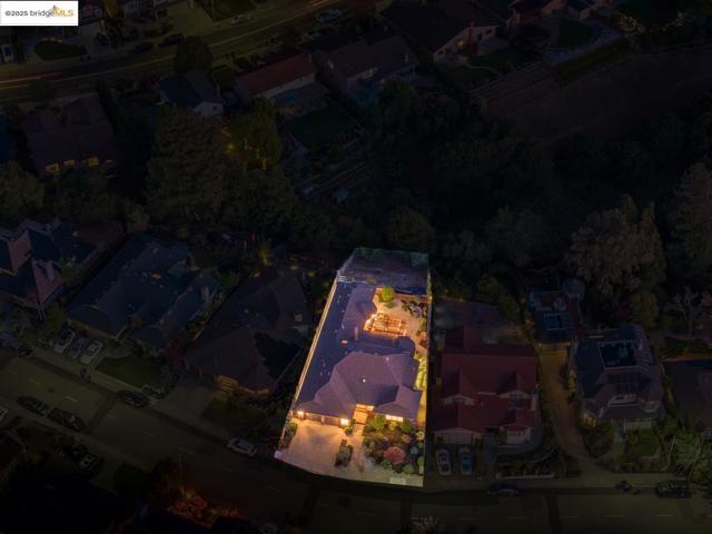 Aerial perspective of suburban area with property parcel outlined