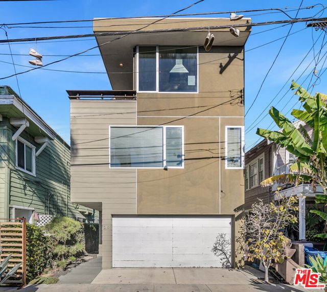 Whether you prefer a quick bike ride to the beach, or a stroll down Abbot Kinney or Main Street - this perfectly located tri-level architectural is just what you've been looking for! There's a 2 car garage on the ground floor with a bonus room that opens up to the beautifully landscaped deck and garden. Up the gleaming hardwood steps to the second level and you'll discover all three bedrooms and both baths.  The primary suite with Southern exposure is beautifully appointed with an en suite bath and walk-through closet. The bright and airy top level showcases the open concept kitchen/living/dining rooms with two rooftop balconies - make one a dining deck and the other a star gazing outdoor living room...  Thoughtful built-in touches, recessed lights, hardwood floors and polished concrete.  Enjoy the home partially furnished or unfurnished - your choice!
